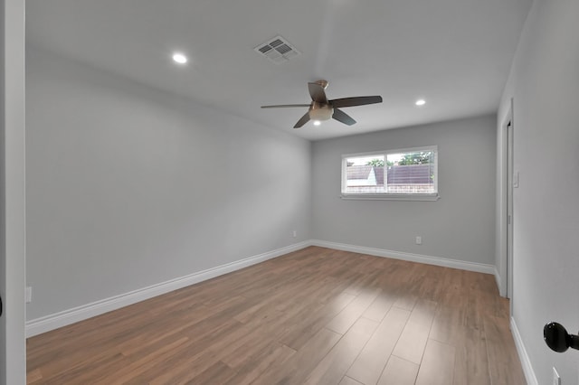 2806 Triway Ln, Houston, TX 77043 - empty room with ceiling fan, wood finished floors, recessed lighting, and baseboards
