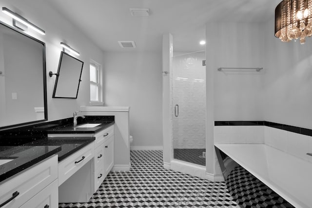 2806 Triway Ln, Houston, TX 77043 - bathroom featuring a stall shower, a bath, tile patterned floors, double vanity, and toilet