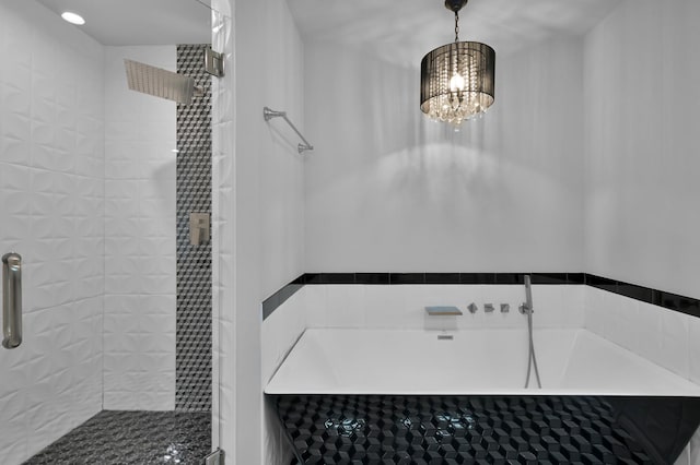 2806 Triway Ln, Houston, TX 77043 - full bath featuring a chandelier and tiled shower