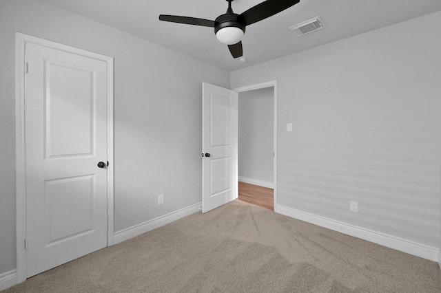 2806 Triway Ln, Houston, TX 77043 - unfurnished bedroom with carpet, baseboards, and a ceiling fan