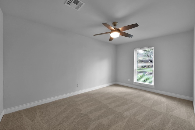 2806 Triway Ln, Houston, TX 77043 - empty room featuring a ceiling fan, light colored carpet, and baseboards