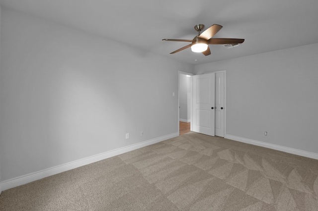 2806 Triway Ln, Houston, TX 77043 - unfurnished bedroom featuring carpet flooring, baseboards, and a ceiling fan