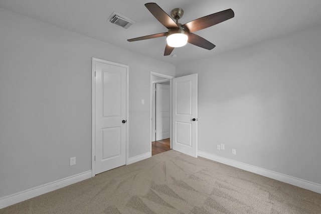 2806 Triway Ln, Houston, TX 77043 - unfurnished bedroom featuring carpet flooring, baseboards, and ceiling fan