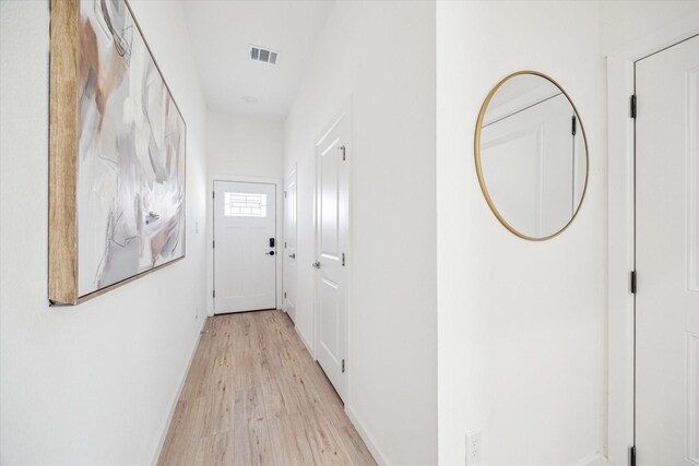 927 Bianco Ln, Houston, TX 77091 - hall featuring light wood-type flooring and baseboards