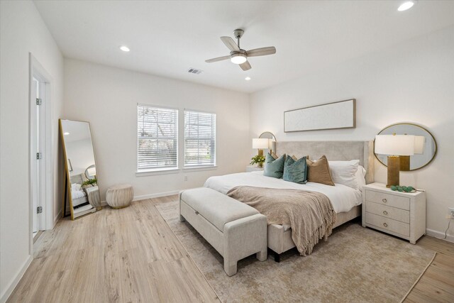 927 Bianco Ln, Houston, TX 77091 - bedroom featuring light wood-style floors, baseboards, recessed lighting, and ceiling fan