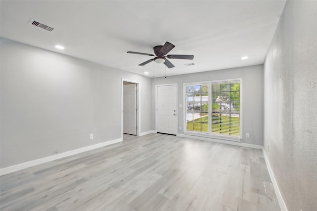 3221 Texas Ave, Texas City, TX 77590 - empty room with light wood-type flooring, a ceiling fan, and recessed lighting