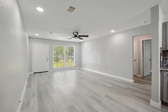 3221 Texas Ave, Texas City, TX 77590 - unfurnished room with a ceiling fan, recessed lighting, and light wood-type flooring