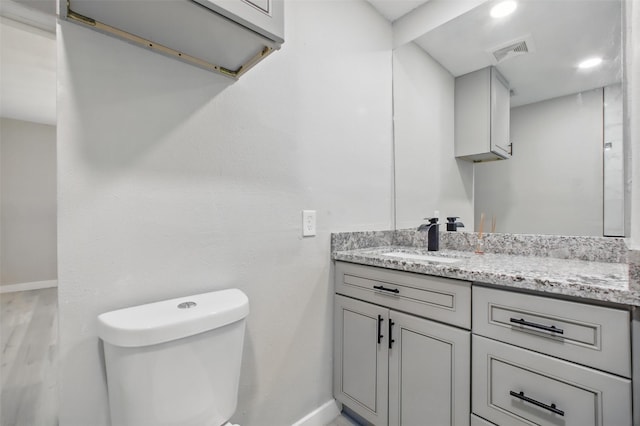 3221 Texas Ave, Texas City, TX 77590 - bathroom with vanity and wood finished floors