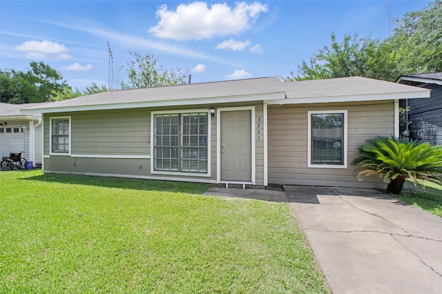 3221 Texas Ave, Texas City, TX 77590 - view of front of home with a front yard