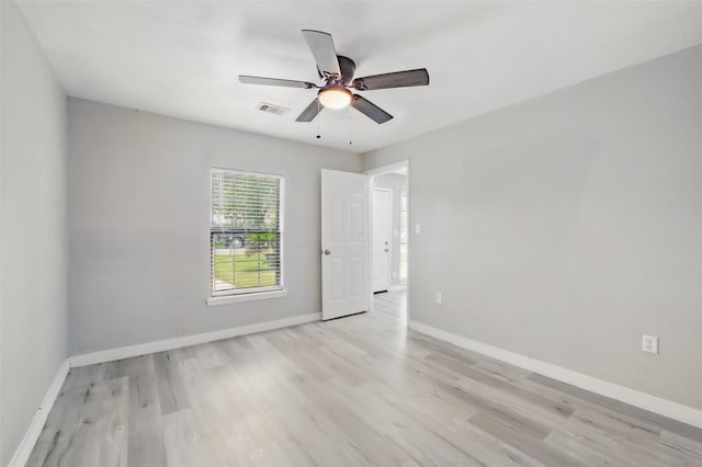 3221 Texas Ave, Texas City, TX 77590 - spare room featuring light wood-type flooring and ceiling fan