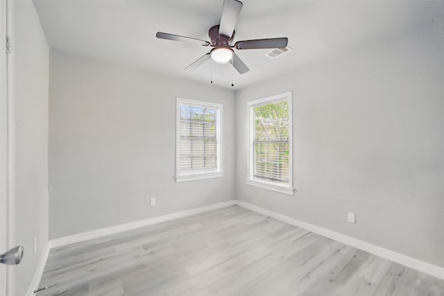 3221 Texas Ave, Texas City, TX 77590 - unfurnished room featuring light wood-type flooring and ceiling fan