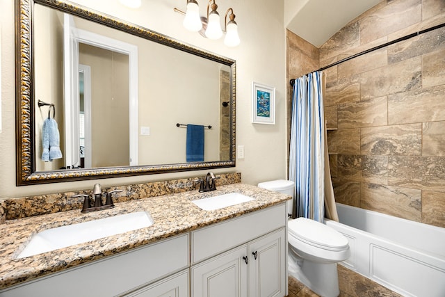 full bathroom with toilet, double vanity, and shower / bath combo