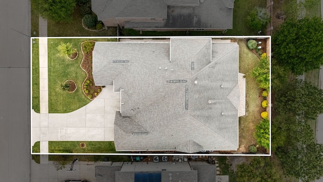 aerial view of property and surrounding area with property parcel outlined