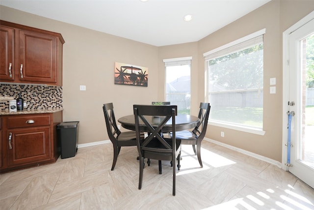 15130 Blackburn Cove Ct, Cypress, TX 77429 - dining area featuring baseboards