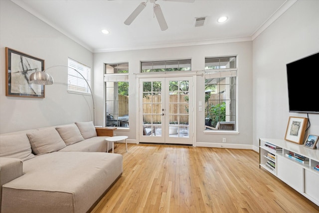 4005 Gramercy St, Houston, TX 77025 - living area featuring ornamental molding, light wood-style floors, a ceiling fan, french doors, and baseboards