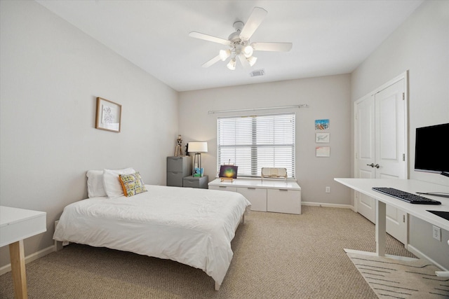 4005 Gramercy St, Houston, TX 77025 - bedroom featuring an office area, light colored carpet, baseboards, and a ceiling fan