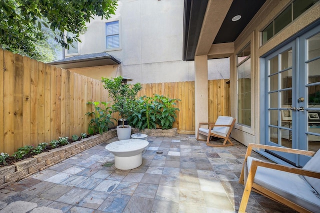 4005 Gramercy St, Houston, TX 77025 - view of patio with a fenced backyard and french doors