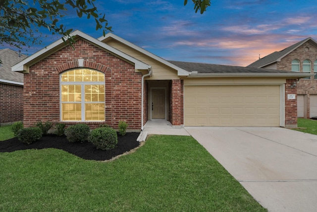 2614 Leopard Ct, Katy, TX 77449 - single story home with brick siding, concrete driveway, an attached garage, a yard, and roof with shingles