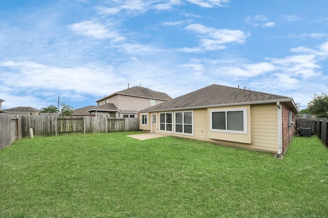 2614 Leopard Ct, Katy, TX 77449 - rear view of house with central air condition unit, a patio, and roof with shingles