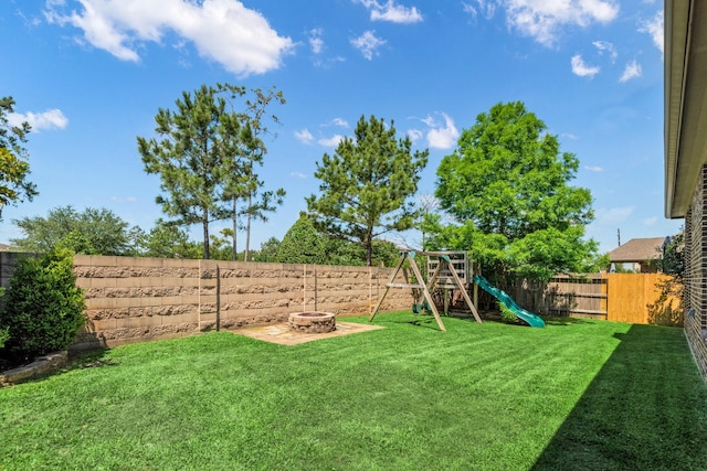 28437 Ofallon Mills Dr, Spring, TX 77386 - view of yard with a fire pit and a playground