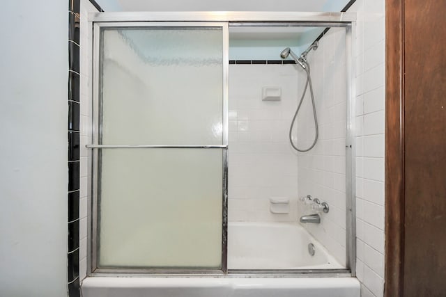 1417 Brigance Rd, Brazoria, TX 77422 - bathroom with combined bath / shower with glass door