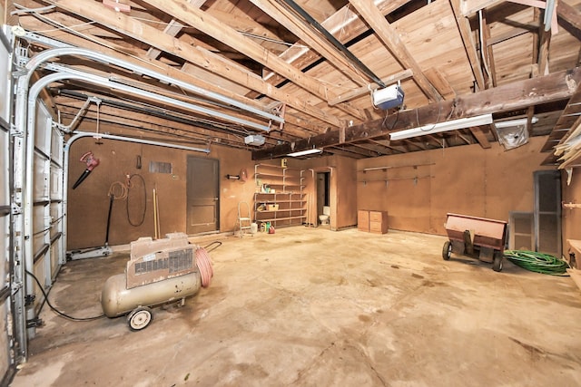 1417 Brigance Rd, Brazoria, TX 77422 - garage featuring a garage door opener