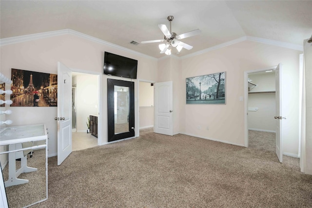 2814 Dustin Place Ct, Humble, TX 77396 - unfurnished bedroom with lofted ceiling, carpet floors, a spacious closet, ornamental molding, and baseboards