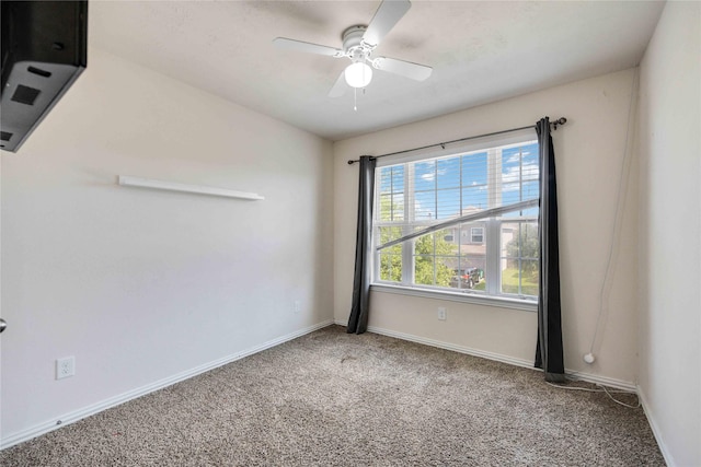 2814 Dustin Place Ct, Humble, TX 77396 - carpeted spare room featuring ceiling fan and baseboards