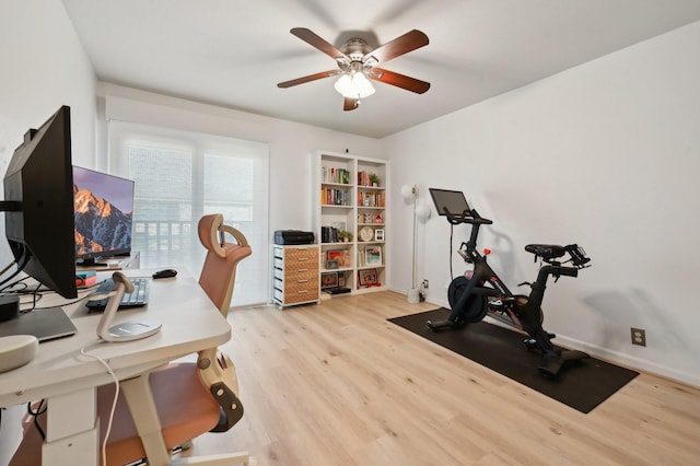 2829 Timmons Ln Unit 184, Houston, TX 77027 - office with light wood finished floors, ceiling fan, and baseboards