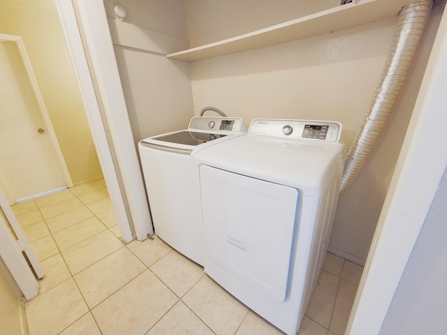 23930 Griffin House Ln, Katy, TX 77493 - clothes washing area featuring separate washer and dryer and light tile patterned floors