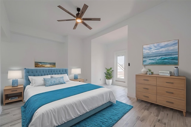 3663 Nasa Pkwy Unit 703, Seabrook, TX 77586 - bedroom featuring light wood-type flooring and a ceiling fan
