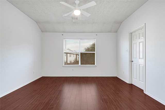 16106 Greenport Ln, Houston, TX 77084 - spare room with a textured ceiling, wood finished floors, vaulted ceiling, ceiling fan, and baseboards