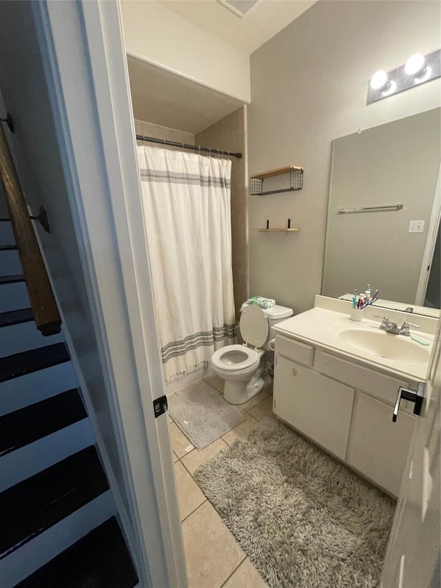 14720 Branchwest Dr, Houston, TX 77082 - bathroom featuring tile patterned floors, toilet, vanity, and a shower with shower curtain