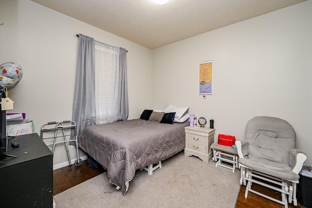 14720 Branchwest Dr, Houston, TX 77082 - bedroom with wood finished floors and baseboards