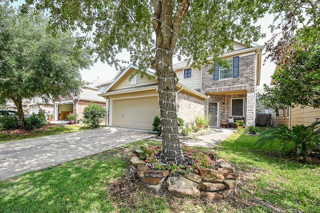 14720 Branchwest Dr, Houston, TX 77082 - view of front of home with brick siding, concrete driveway, an attached garage, and a front lawn
