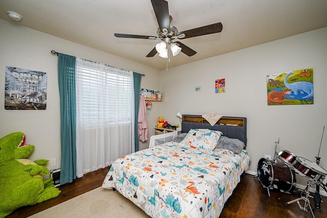 14720 Branchwest Dr, Houston, TX 77082 - bedroom with wood finished floors and a ceiling fan