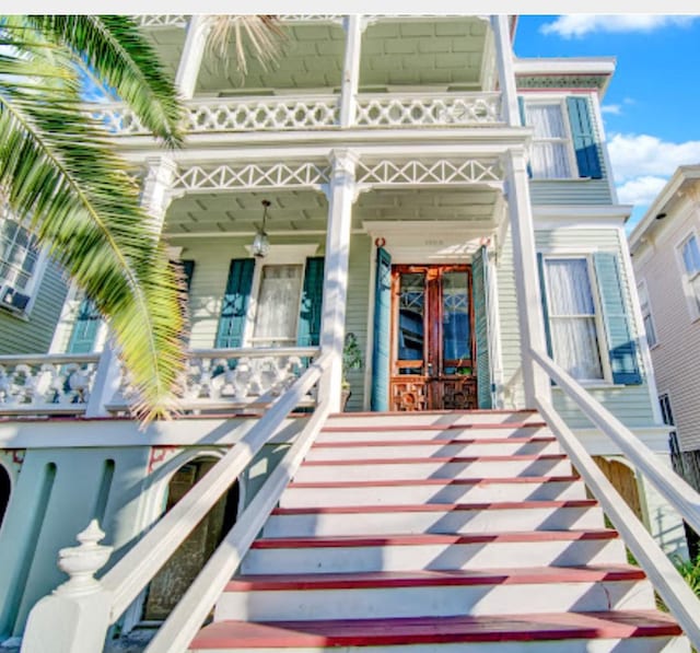 2113 Ball, Galveston, TX 77550 - entrance to property with a balcony and a porch