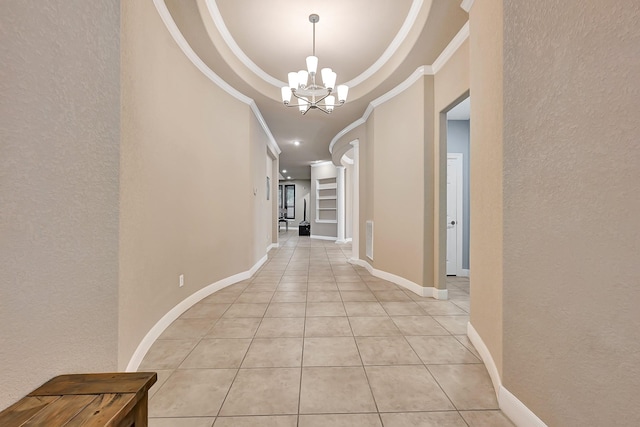 8303 Crescent Knolls Dr, Richmond, TX 77406 - hall with crown molding, a chandelier, a textured wall, light tile patterned flooring, and baseboards