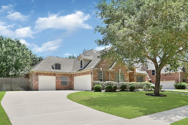 8303 Crescent Knolls Dr, Richmond, TX 77406 - view of front of property featuring brick siding, driveway, an attached garage, and a shingled roof