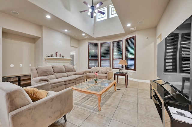 8303 Crescent Knolls Dr, Richmond, TX 77406 - living area with ceiling fan, light tile patterned flooring, recessed lighting, baseboards, and a towering ceiling
