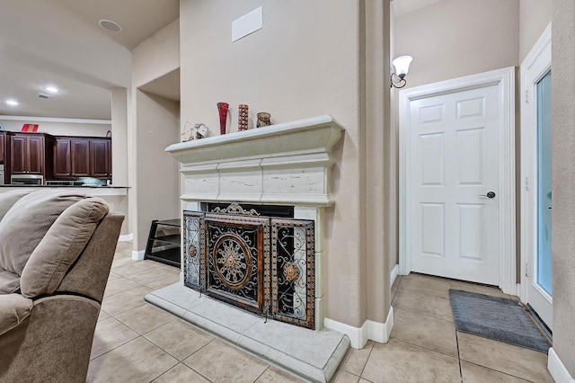 8303 Crescent Knolls Dr, Richmond, TX 77406 - living room featuring a fireplace with raised hearth, light tile patterned floors, and baseboards