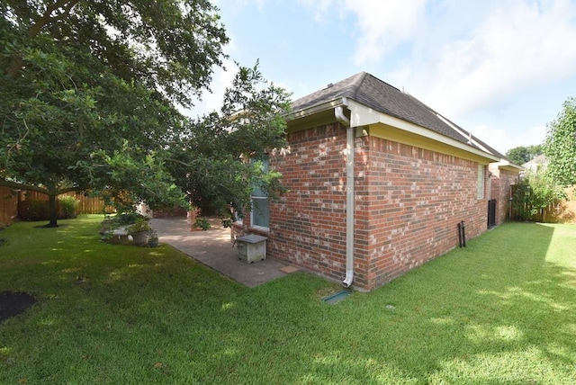 8303 Crescent Knolls Dr, Richmond, TX 77406 - view of home's exterior with a patio and brick siding
