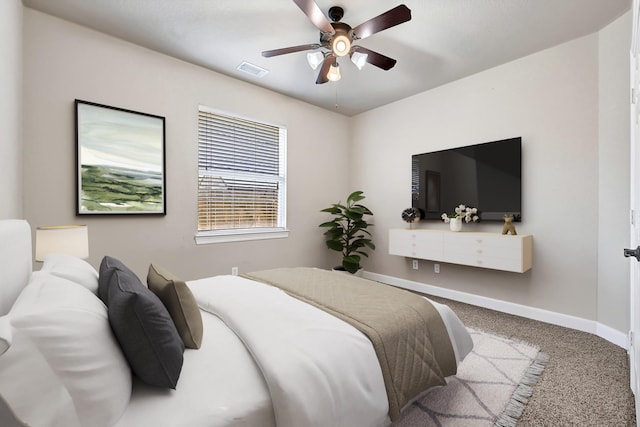 8303 Crescent Knolls Dr, Richmond, TX 77406 - carpeted bedroom with baseboards and a ceiling fan