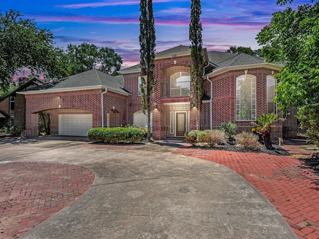 3311 El Dorado Blvd, Missouri City, TX 77459 - traditional home featuring brick siding, concrete driveway, roof with shingles, and a garage
