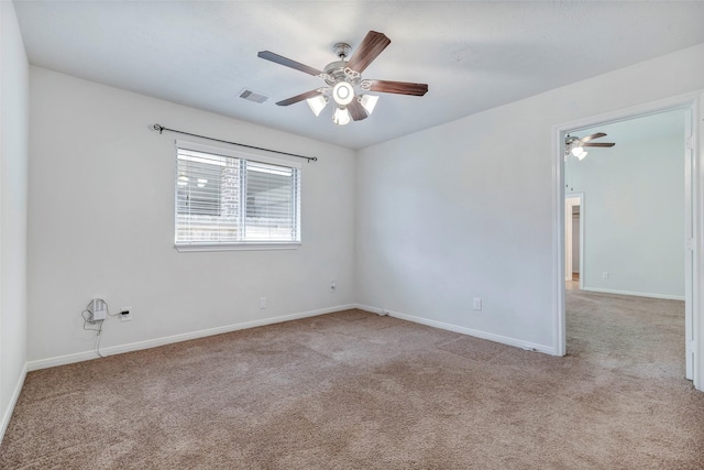 6722 Hawkins St, Manvel, TX 77578 - carpeted empty room featuring a ceiling fan and baseboards