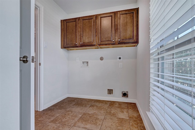 6722 Hawkins St, Manvel, TX 77578 - laundry area featuring hookup for an electric dryer, hookup for a washing machine, cabinet space, and baseboards