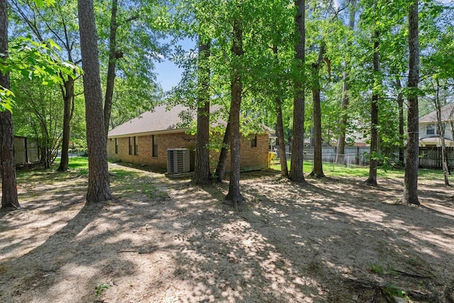 44 Westchester Dr, Conroe, TX 77304 - view of yard with fence and central AC