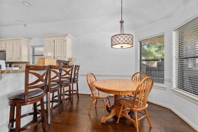 44 Westchester Dr, Conroe, TX 77304 - dining area featuring dark wood-style flooring