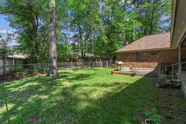 44 Westchester Dr, Conroe, TX 77304 - view of yard featuring a patio