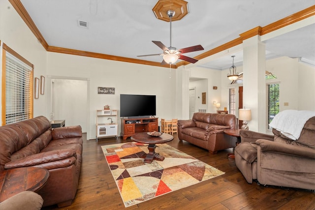 44 Westchester Dr, Conroe, TX 77304 - living area with dark wood finished floors, ornamental molding, and ceiling fan